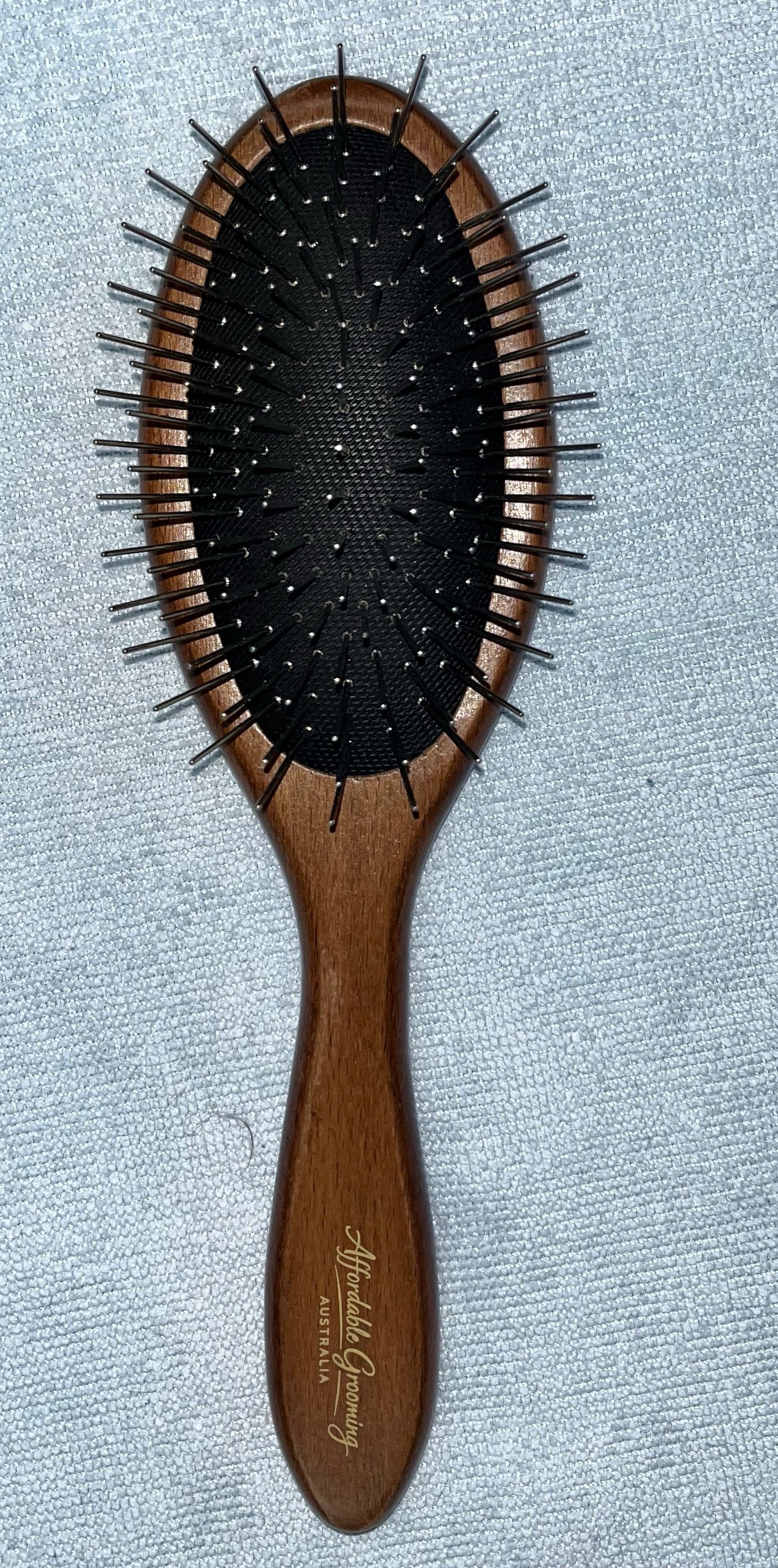 Light beach polished stained beach wood long pin brush